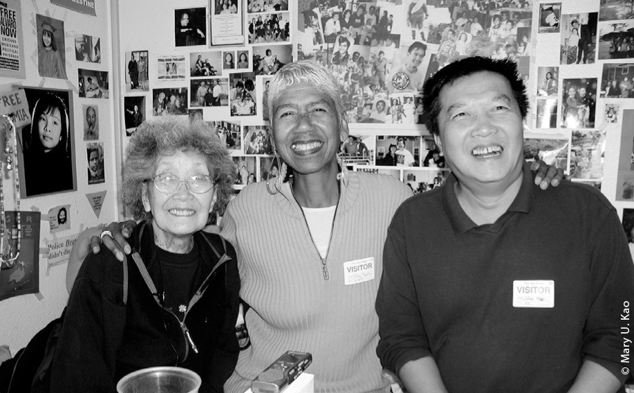 Yuri Kochiyama, Ericka Huggins and John Kao in Yuri’s Oakland apartment.